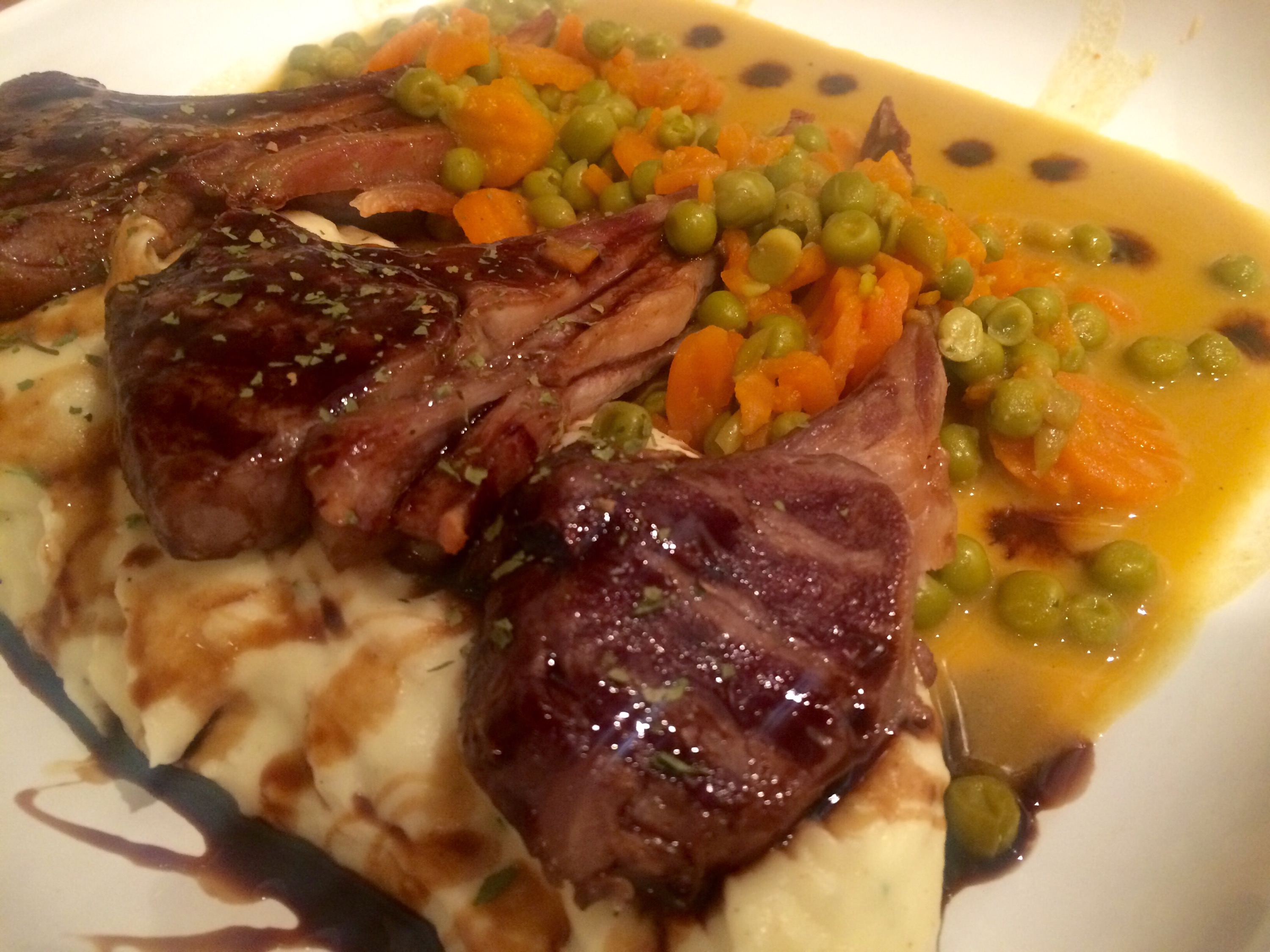 Optigrill frenched lamb chops, whipped cream potatoes, French lamby
peas and carrots 